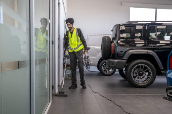 Commercial floor polishing and cleaning services at Andrew Simms – Kowhai Cleaning delivering high-standard hygiene in automotive retail spaces.